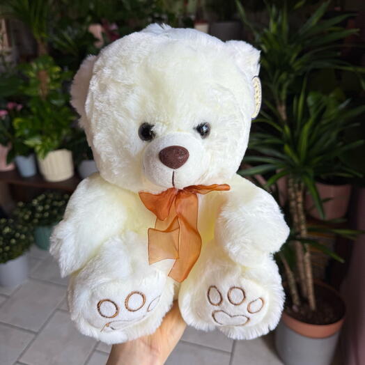 Cream-colored plush toy