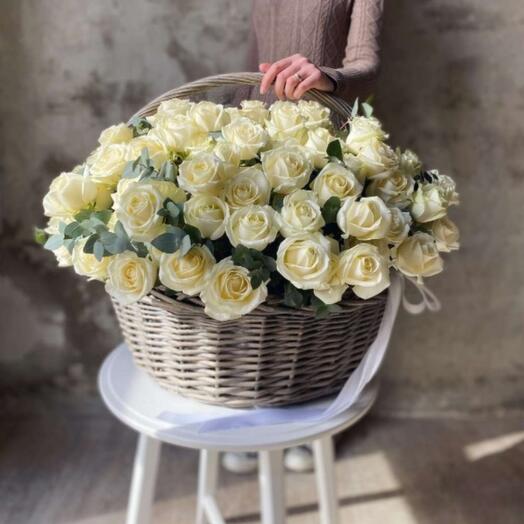 151 roses in a basket with eucalyptus