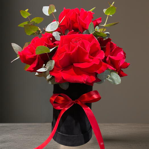 Box with fresh roses