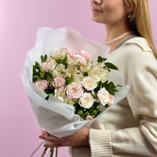 A bouquet of spray roses and alstroemerias