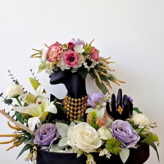 Wedding jewelery in fresh floral arrangement