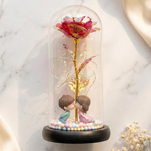 Rose flowers and a couple in dome with led light installed