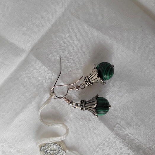 Linda, Malachite earing