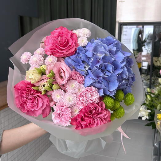 A bright bouquet with a lavender hydrangea