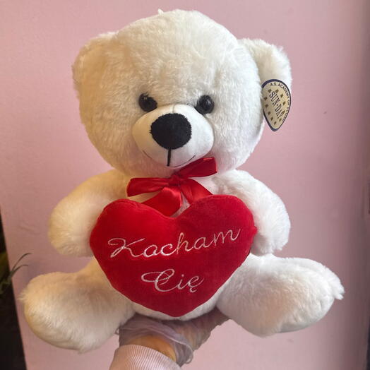 Small teddy bear with a heart
