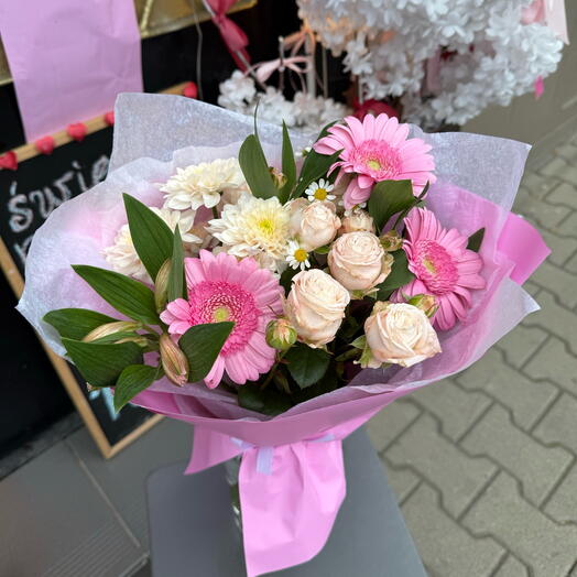 Bouquet of the day with gerberas and a rose with sprigs