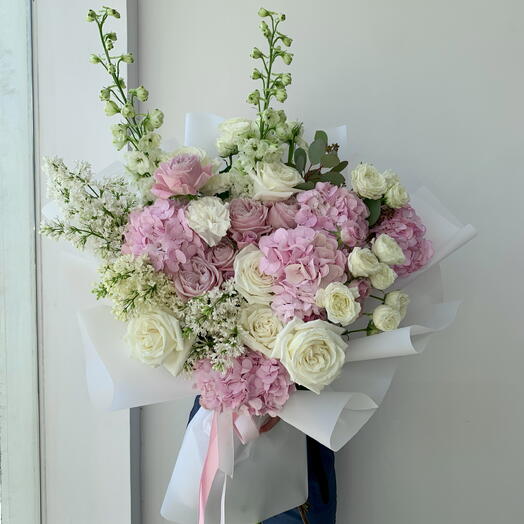 Pink expressive bouquet with pink peony roses, hydrangeas, syringa lilac
