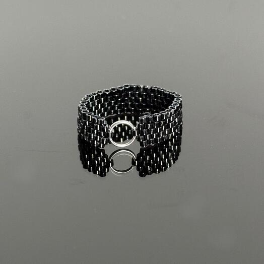 Beaded ring with an insert