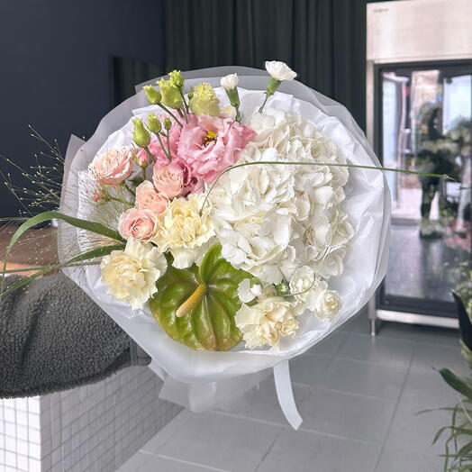 Summer bouquet with a white hydrangea