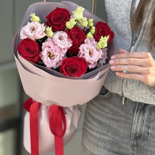 Mix of red roses and eustomas