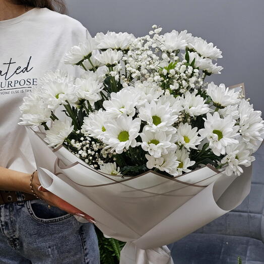 Bouquet of chamomile chrysanthemums and gypsophila