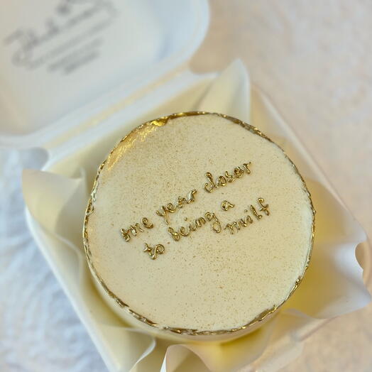 Bento cake decorated with edible gold