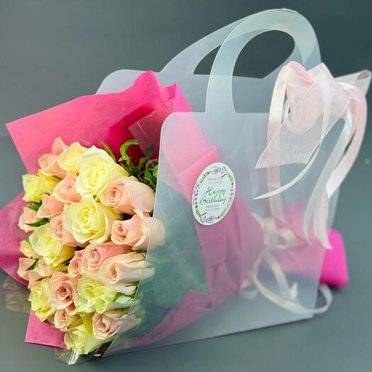 Bouquet of 15 white and pink 40-cm roses in a gift box with a sticker