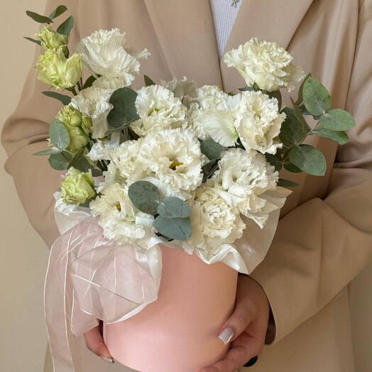 A delicate eustoma in a hatbox