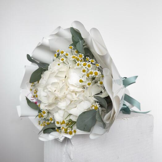 White hydrangea with daisies and eucalyptus