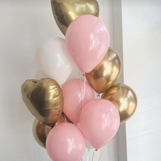 Gold heart-shaped birthday balloons