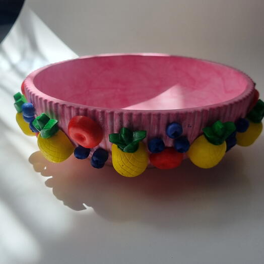 Decorative plaster bowl with molded pineapples and berries