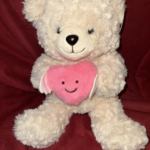 a soft, light-colored bear