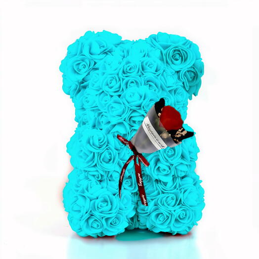 Teddy bear made of artificial turquoise roses.