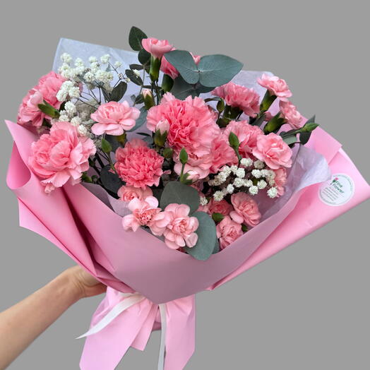 Delicate bouquet of pink carnations