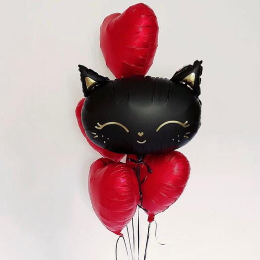 Black kitten with hearts