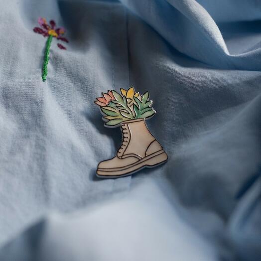 Ceramic brooch "Flowers in a Boot"
