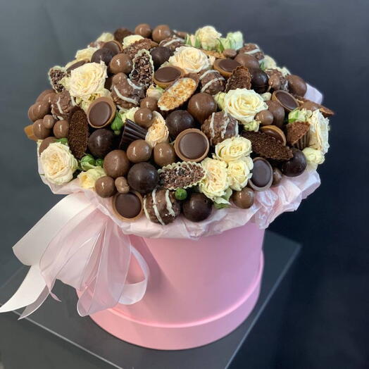 Composition with chocolate and flowers