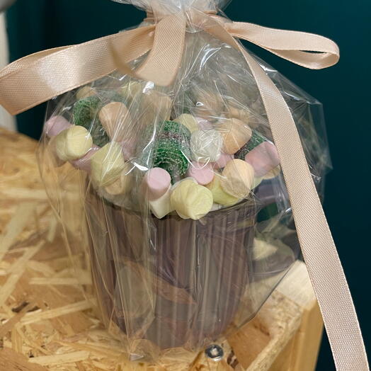 A mug with sweets