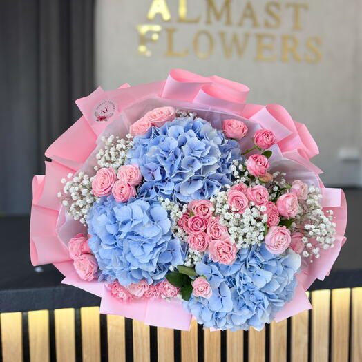 Blue hydrangeas and spray roses bouquet