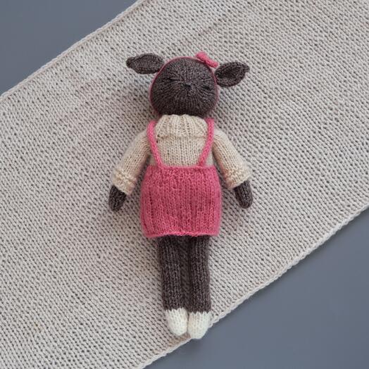 A deer in a dress