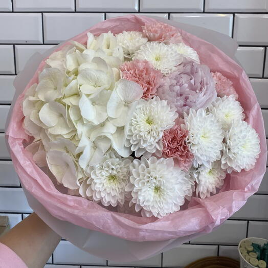 A bouquet of delicate flowers for a girl