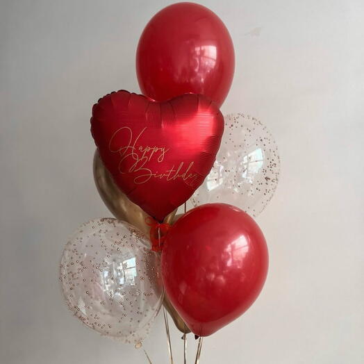 Set of balloons in red and gold shades