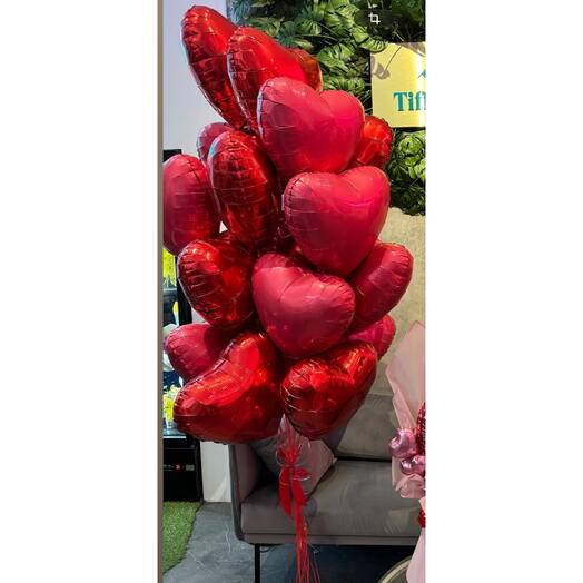 Premium balloon bouquet of 20 red heart-shaped balloons