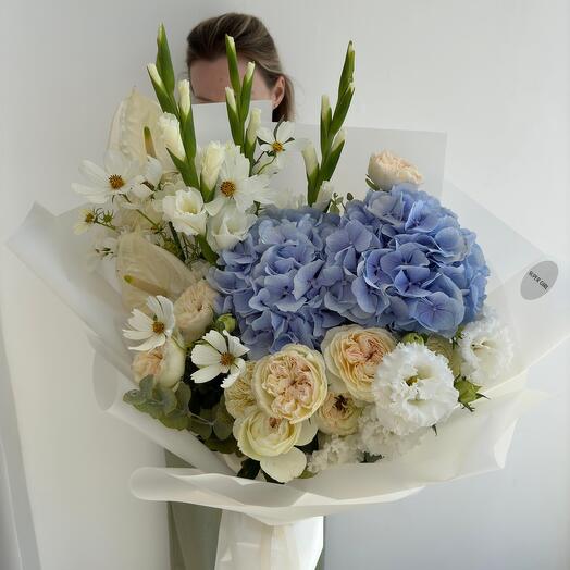 Sky blue bouquet with hydrangea and garden roses