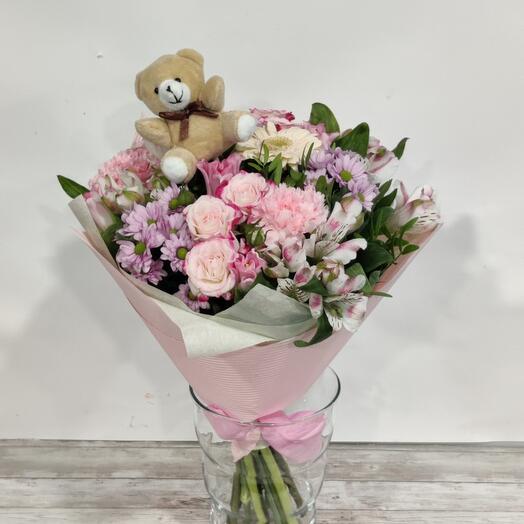 Flowers bouquet with teddy bear
