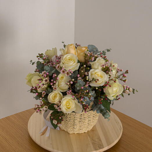 Delicate roses in a basket