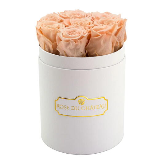 Everlasting tea roses in a small white box, real flowers